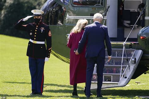 who is the white haired woman escorting the president